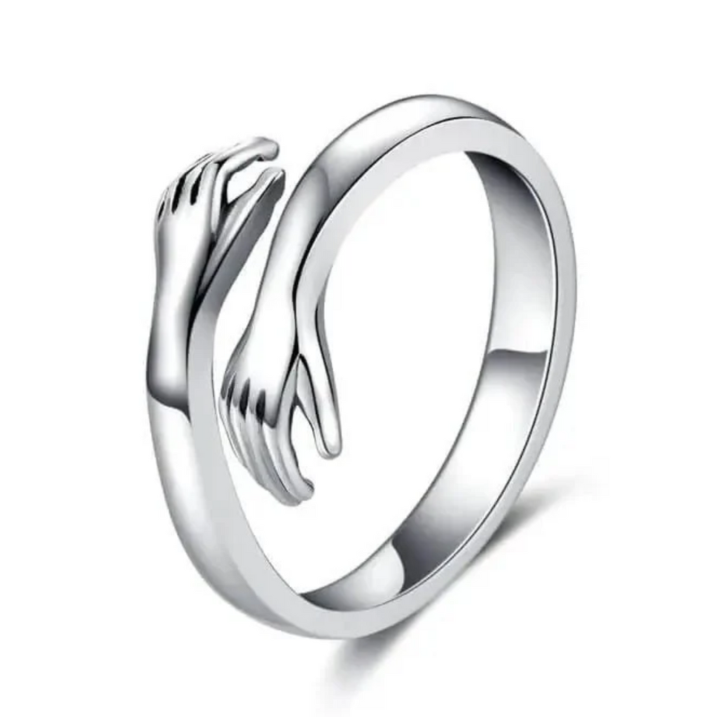 Câline | Ring med omfavnende symbol