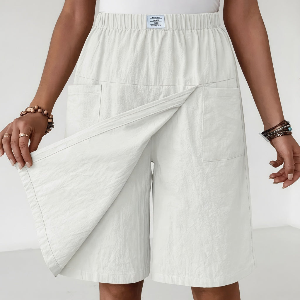 Romy | Slå-om-nederdelshorts med lommer