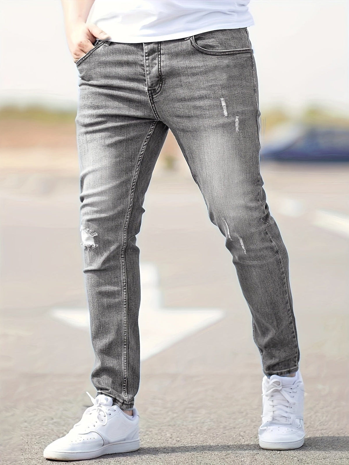 Clovis | Slim fit jeans med slidte detaljer