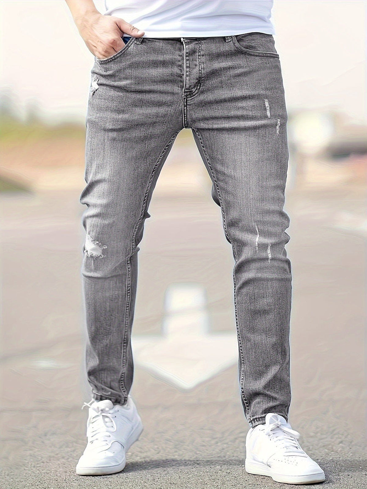 Clovis | Slim fit jeans med slidte detaljer