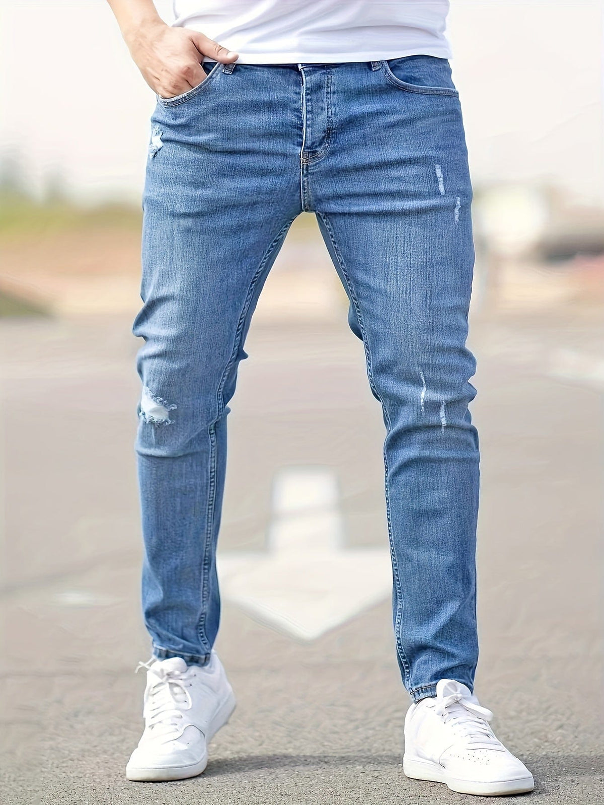 Clovis | Slim fit jeans med slidte detaljer