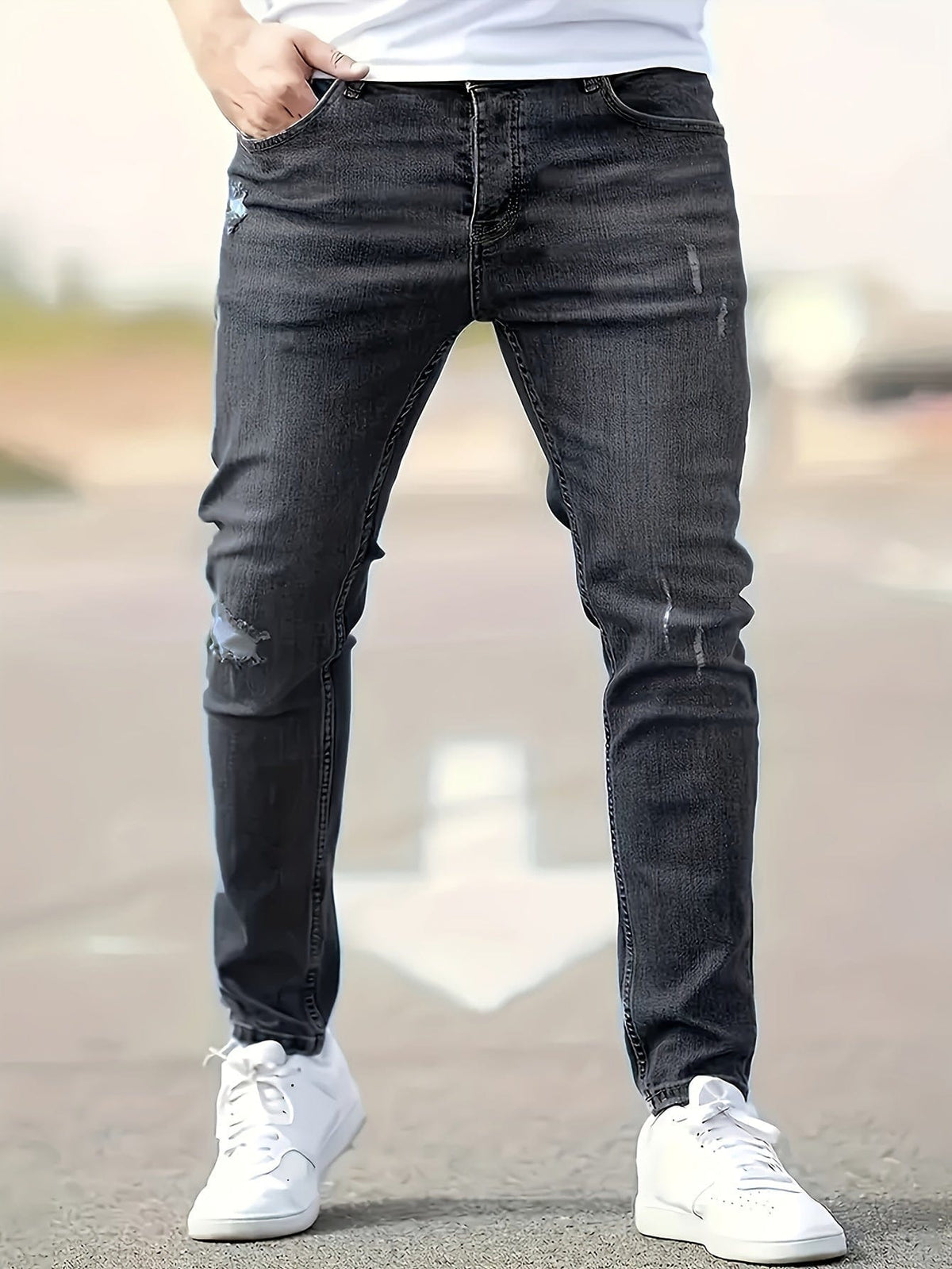 Clovis | Slim fit jeans med slidte detaljer